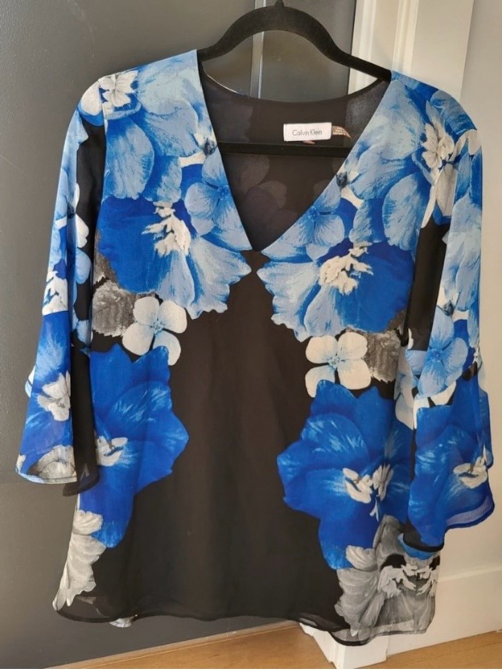 Calvin Klein Black Sheer V-Neck blouse with Blue Floral Print